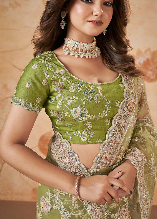 Green Heavy Embroidered Wedding Saree In Net